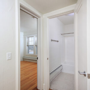 Inside Closet Looking out to Living Space & Bathroom