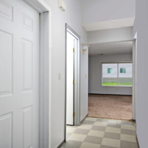 Hallway, Door to Garage and Bathroom